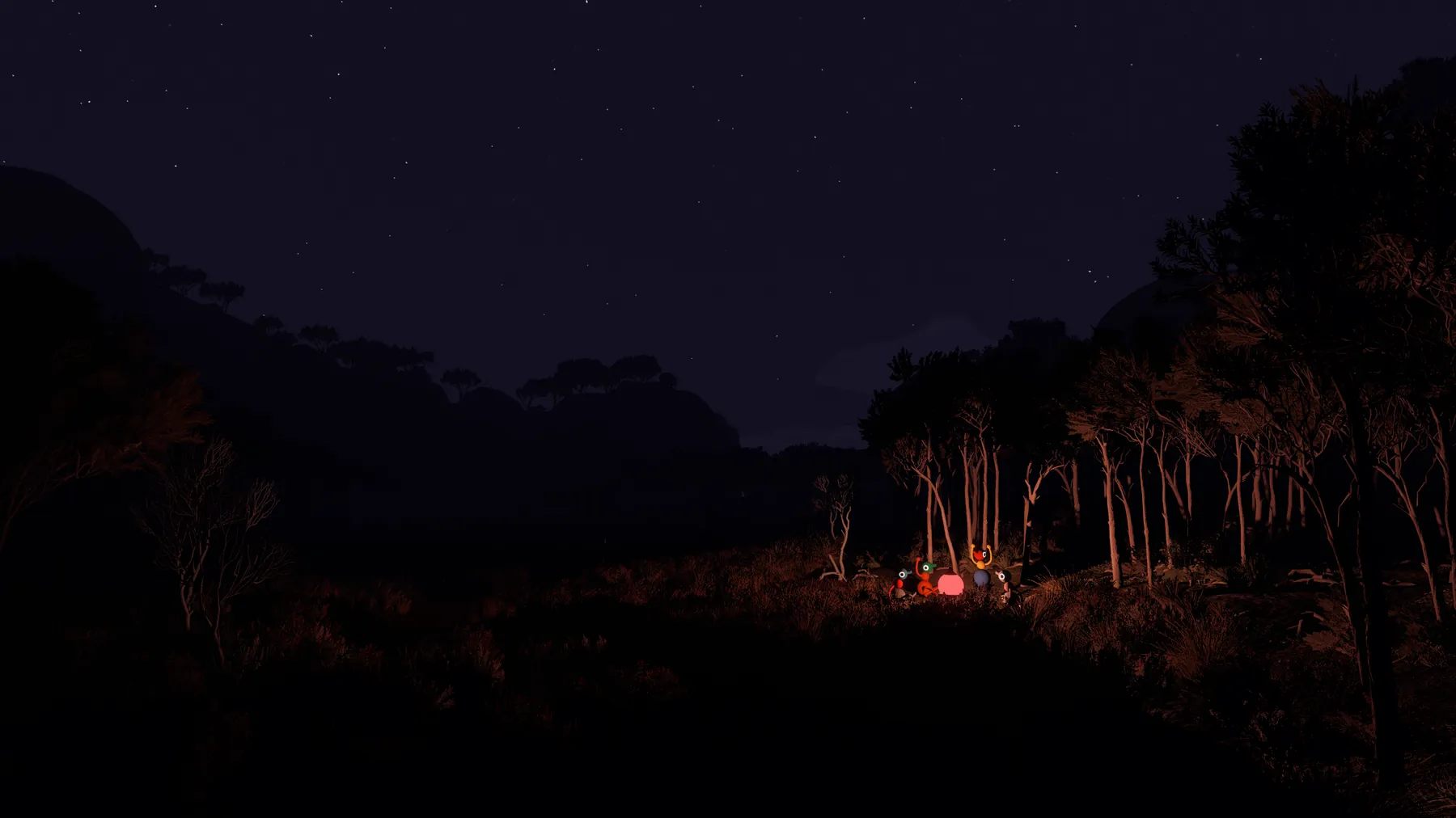 Big Walk players gathered around a campfire at night